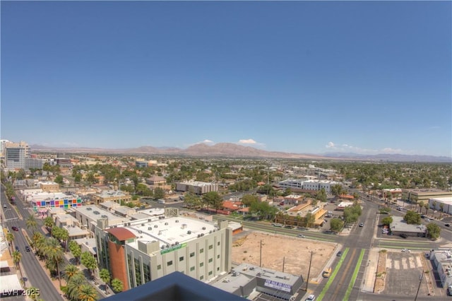 drone / aerial view featuring a mountain view