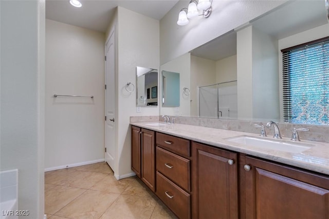 full bathroom with double vanity, a sink, an enclosed shower, and tile patterned floors