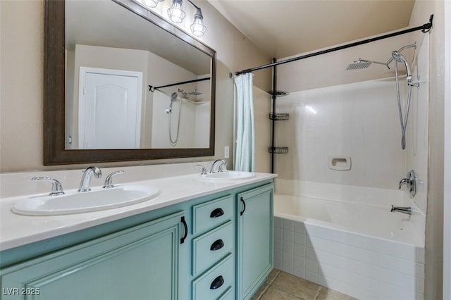 full bath featuring double vanity, a sink, tile patterned flooring, and shower / tub combo