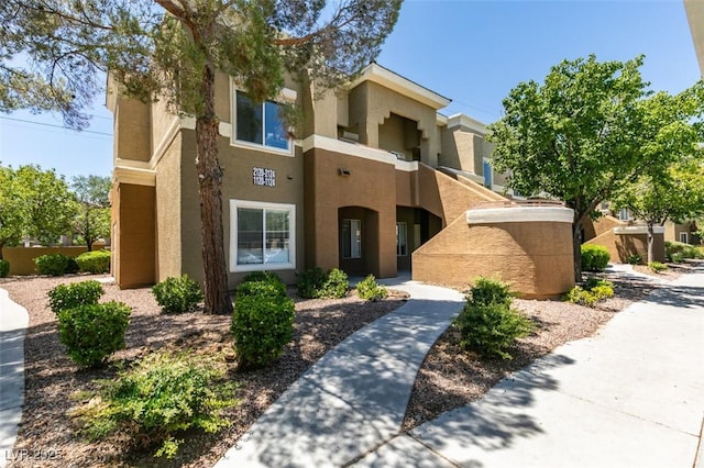 8070 W Russell Rd Unit 2121, Las Vegas, NV 89113 - view of front facade with stucco siding