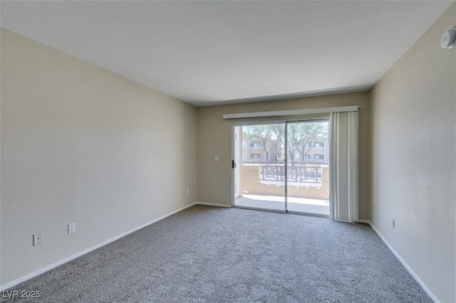 8070 W Russell Rd Unit 2121, Las Vegas, NV 89113 - spare room featuring carpet and baseboards