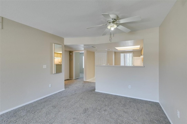 8070 W Russell Rd Unit 2121, Las Vegas, NV 89113 - unfurnished room with a ceiling fan, baseboards, and carpet floors