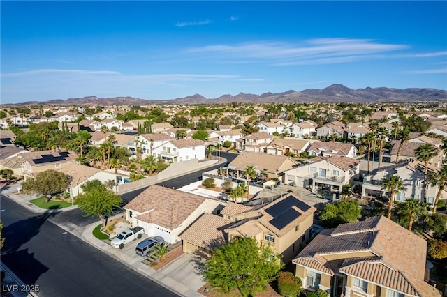 drone / aerial view featuring a mountain view and a residential view