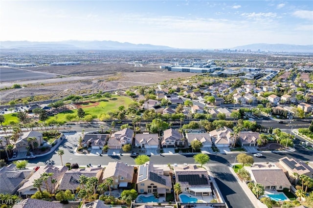 birds eye view of property with a residential view and a mountain view