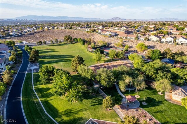 birds eye view of property with a residential view and a mountain view