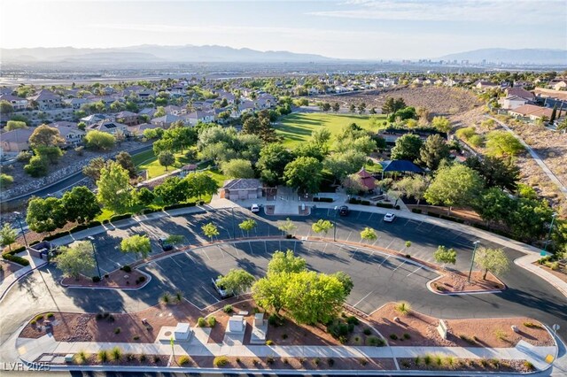 bird's eye view with a residential view and a mountain view