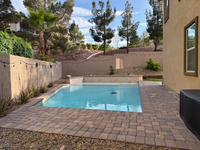2947 Caxton Grove Dr, Henderson, NV 89052 - view of pool featuring a fenced in pool, a fenced backyard, cooling unit, and a patio