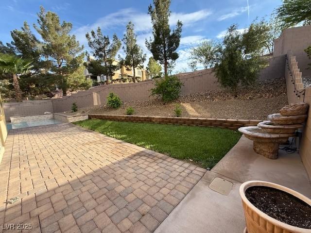 2947 Caxton Grove Dr, Henderson, NV 89052 - view of patio / terrace with a fenced backyard