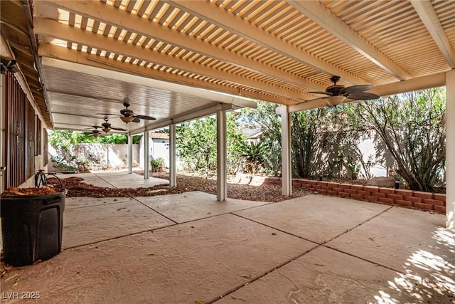 view of patio featuring a fenced backyard, a pergola, and ceiling fan