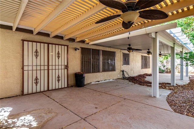 view of patio / terrace featuring ceiling fan