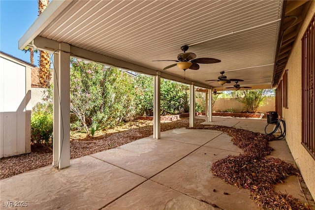 view of patio / terrace featuring a fenced backyard and a ceiling fan