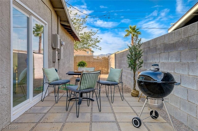 view of patio / terrace featuring a fenced backyard and area for grilling