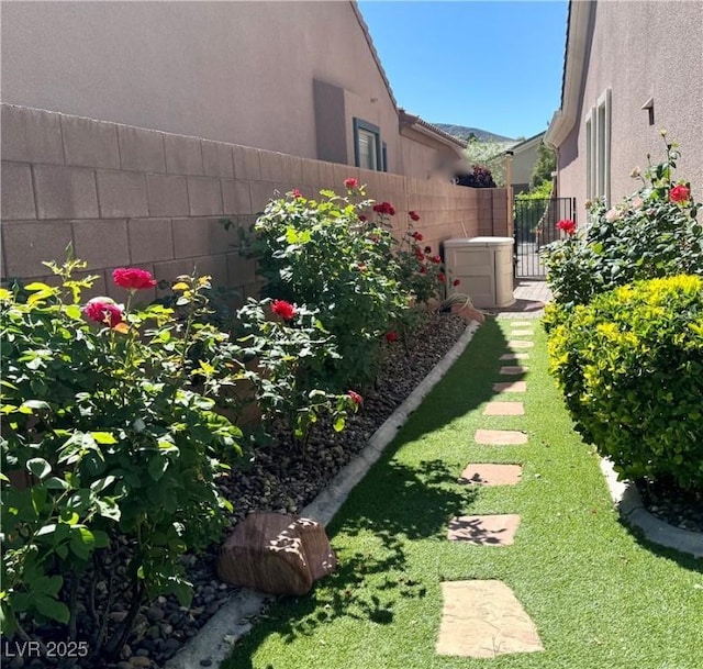 2312 Indigo Island St, Henderson, NV 89044 - view of yard featuring central AC and fence