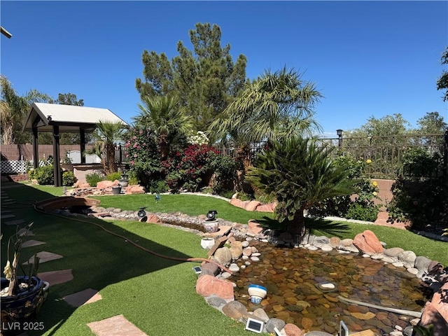 2312 Indigo Island St, Henderson, NV 89044 - view of yard featuring a gazebo and fence