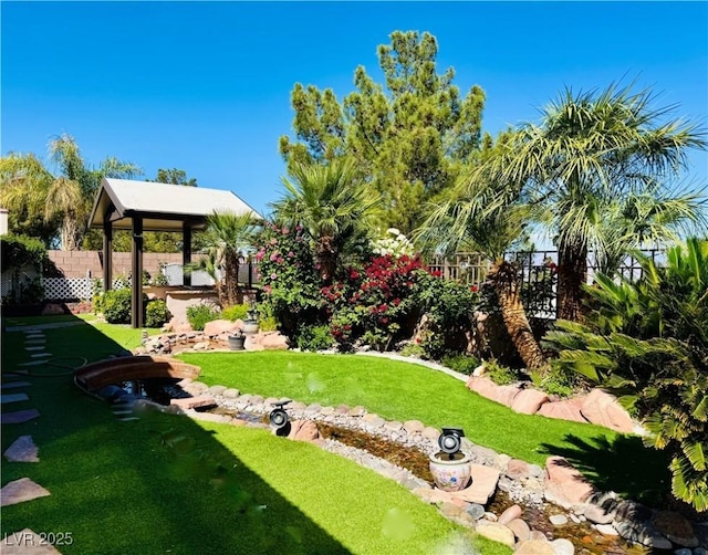 2312 Indigo Island St, Henderson, NV 89044 - view of yard featuring a gazebo and fence