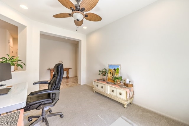 home office featuring a ceiling fan, recessed lighting, and light carpet