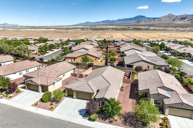 bird's eye view with a mountain view and a residential view