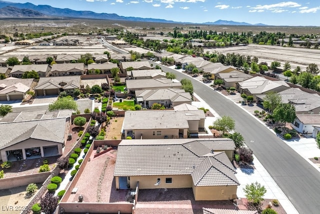 aerial view featuring a residential view and a mountain view
