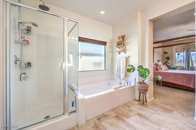 ensuite bathroom with a shower stall, a garden tub, and connected bathroom
