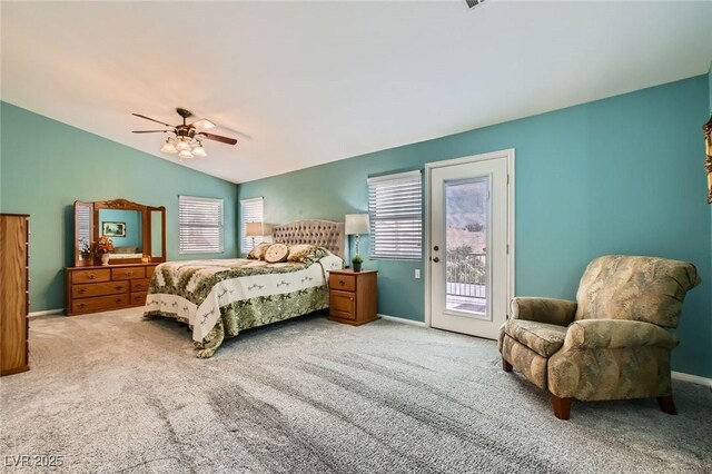 bedroom featuring access to outside, baseboards, lofted ceiling, and carpet