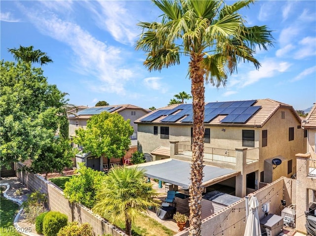 8217 Fritzen Ave, Las Vegas, NV 89131 - view of building exterior featuring a fenced backyard and a residential view