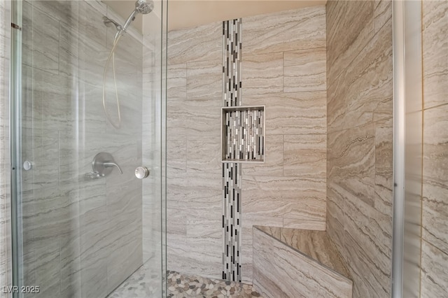 bathroom featuring a stall shower