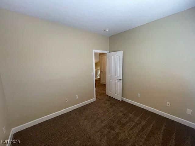 137 Coronation Ave, Las Vegas, NV 89123 - carpeted empty room with baseboards
