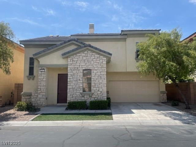 137 Coronation Ave, Las Vegas, NV 89123 - view of front of property with concrete driveway, stone siding, and stucco siding