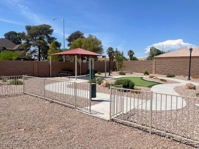 137 Coronation Ave, Las Vegas, NV 89123 - view of home's community with a fenced backyard and a patio area