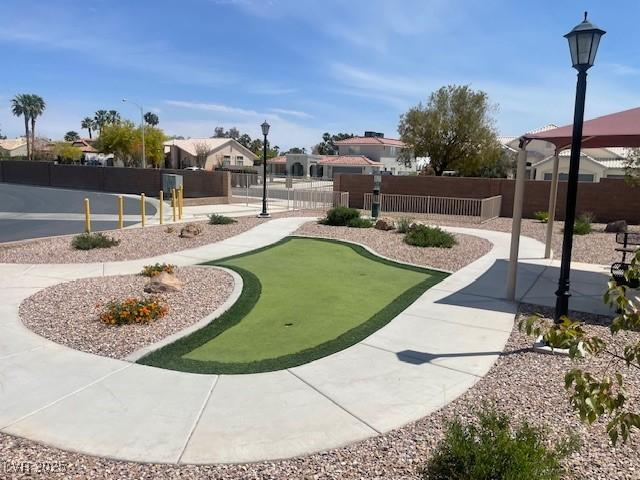 137 Coronation Ave, Las Vegas, NV 89123 - view of property's community with a patio, fence, and a residential view