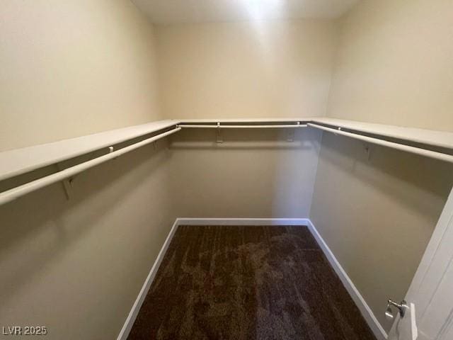 137 Coronation Ave, Las Vegas, NV 89123 - spacious closet featuring dark colored carpet
