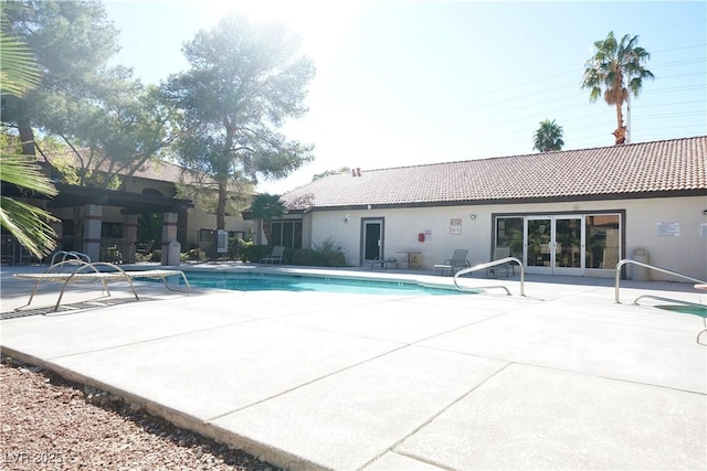 view of pool with a patio and a fenced in pool