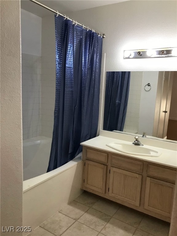 full bathroom with vanity, tile patterned flooring, and shower / tub combo with curtain