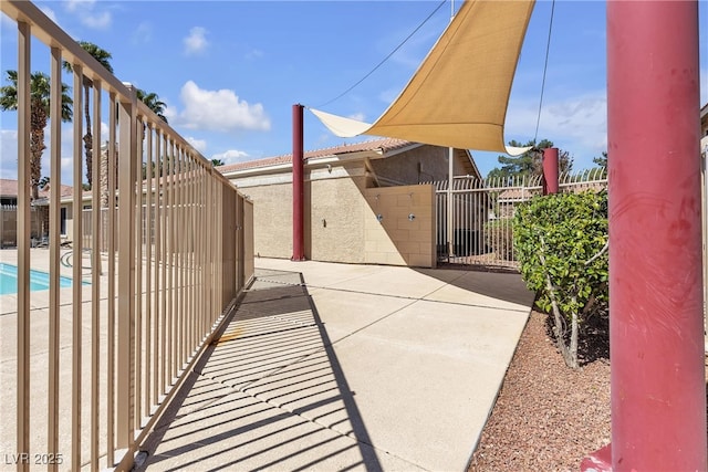 7200 Pirates Cove Rd Unit 2025, Las Vegas, NV 89145 - view of patio featuring fence and a community pool