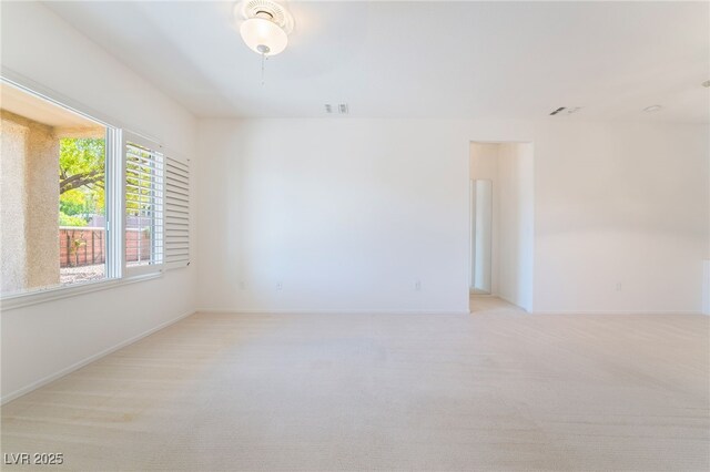 1781 Cypress Lake Ct, Henderson, NV 89012 - empty room with baseboards, visible vents, and light carpet