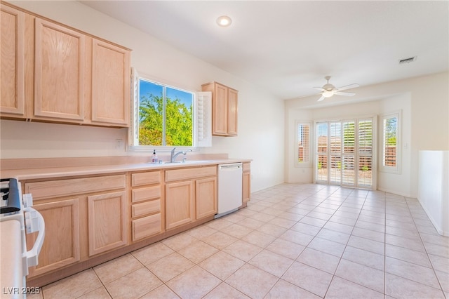 1781 Cypress Lake Ct, Henderson, NV 89012 - kitchen with visible vents, a sink, light brown cabinetry, and dishwasher
