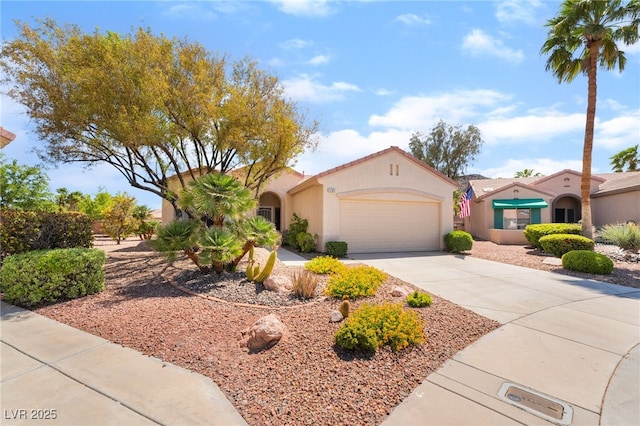 1781 Cypress Lake Ct, Henderson, NV 89012 - mediterranean / spanish home with concrete driveway, stucco siding, and a garage