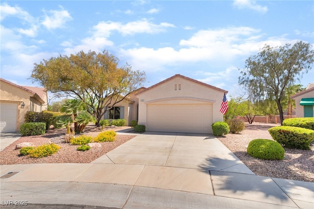 1781 Cypress Lake Ct, Henderson, NV 89012 - mediterranean / spanish house featuring a garage, stucco siding, and concrete driveway