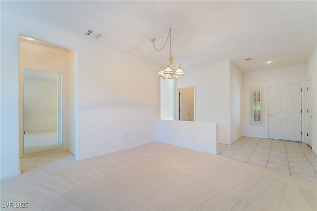1781 Cypress Lake Ct, Henderson, NV 89012 - unfurnished room featuring visible vents, light colored carpet, and an inviting chandelier