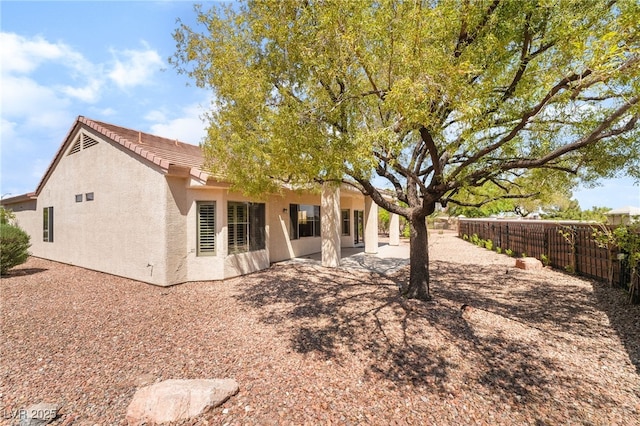 1781 Cypress Lake Ct, Henderson, NV 89012 - back of property featuring a patio, a fenced backyard, and stucco siding