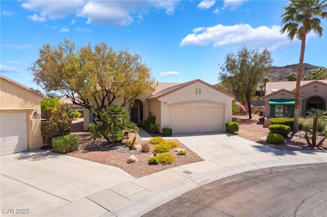 1781 Cypress Lake Ct, Henderson, NV 89012 - view of front of house featuring a garage, stucco siding, concrete driveway, and a tiled roof