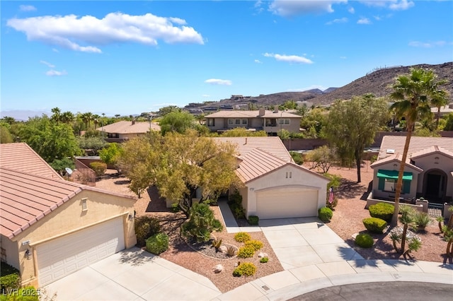 1781 Cypress Lake Ct, Henderson, NV 89012 - view of front of house featuring a residential view, stucco siding, a mountain view, concrete driveway, and a tiled roof