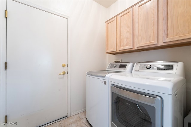 1781 Cypress Lake Ct, Henderson, NV 89012 - laundry room featuring light tile patterned floors, separate washer and dryer, and cabinet space