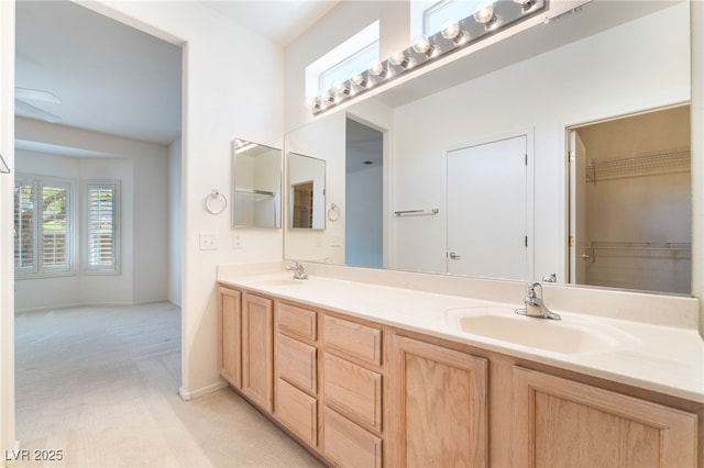 1781 Cypress Lake Ct, Henderson, NV 89012 - full bath with double vanity, baseboards, and a sink