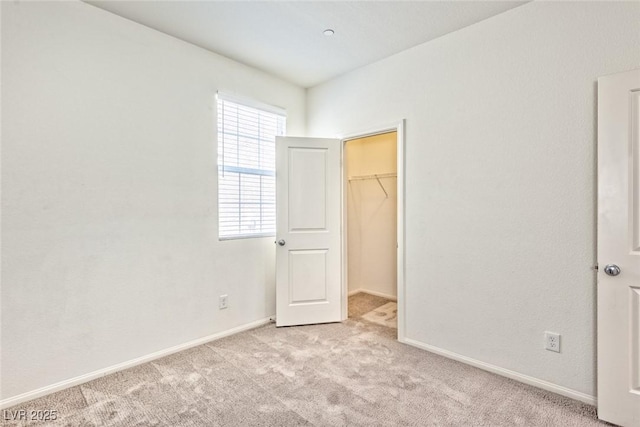 156 Fulgora St, Henderson, NV 89074 - unfurnished bedroom featuring baseboards, carpet, and a spacious closet