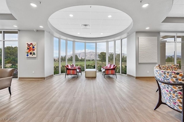 2525 Willow Wren Dr, North Las Vegas, NV 89084 - building lobby featuring floor to ceiling windows, a mountain view, recessed lighting, and a security system