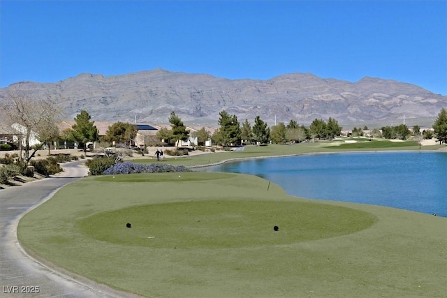 2525 Willow Wren Dr, North Las Vegas, NV 89084 - view of community featuring a water and mountain view, a putting green, and golf course view