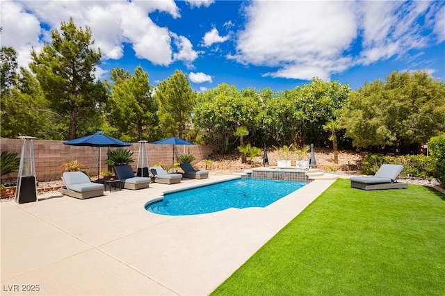 view of swimming pool with a yard, a patio, a fenced in pool, and fence private yard