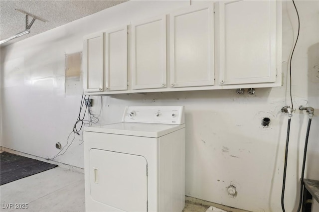 laundry room featuring washer / clothes dryer and cabinet space