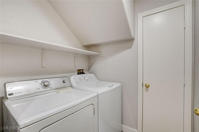 laundry area with laundry area and washer and clothes dryer